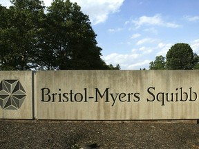 FILE - In this June 15, 2005, file photo, a sign stands in front of a Bristol-Myers Squibb building in a Lawrence Township, N.J. Drugmaker Bristol Myers Squibb is acquiring Karuna Therapeutics, a biopharmaceutical company that has developed a new antipsychotic, in a $14 billion deal. Bristol Myers Squibb and Karuna announced their merger agreement on Friday, Dec. 22, 2023.