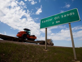 A road sign for the oilsands near Fort McMurray, Alberta.