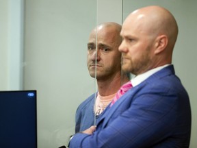 FILE - Joseph Emerson, left, is arraigned in Multnomah County Circuit Court, Oct. 24, 2023, in Portland, Ore. The ex-Alaska Airlines pilot accused of trying to cut the engines of a passenger flight while off-duty and riding in an extra seat in the cockpit can be released from jail pending trial, an Oregon judge said Thursday, Dec. 7.