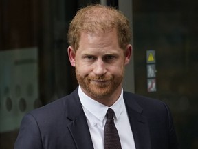 FILE - Prince Harry leaves the High Court after giving evidence in London, Tuesday, June 6, 2023. A judge ordered Prince Harry on Monday, Dec. 11, 2023, to pay nearly 50,000 pounds (over $60,000) in legal fees to the publisher of the Daily Mail tabloid for failing to knock out its defense in a libel lawsuit.