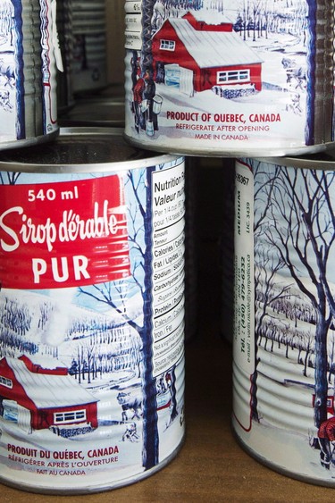 Cans of maple syrup at a sugar shack in Quebec.