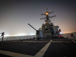 The Arleigh Burke-class guided-missile destroyer USS Carney