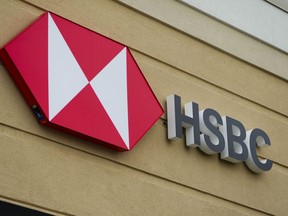 An HSBC bank sign is pictured in Ottawa on Monday, July 11, 2022. HSBC says it expects the sale of its Canadian operations to RBC to officially close in the first quarter of 2024 after the transaction passed its final hurdle on Thursday with the approval of Finance Minister Chrystia Freeland.THE CANADIAN PRESS/Sean Kilpatrick