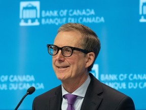 Bank of Canada Governor Tiff Macklem smiles during a news conference following an interest rate announcement, Wednesday, October 25, 2023 in Ottawa. Macklem will give a speech in Toronto on Friday. The central bank kept its key interest rate target on hold at five per cent earlier this month, but cautioned that it is still concerned about risks to the outlook for inflation and remains prepared to raise rates if needed.
