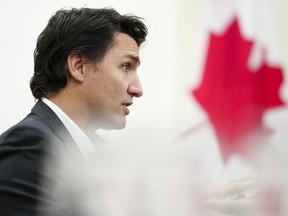 Canada's tax on Netflix and other foreign digital services companies may be a major irritant for the U.S. tech sector, but Prime Minister Justin Trudeau says it doesn't seem to be much concern to President Joe Biden. Trudeau takes part in an interview in Ottawa on Monday, Dec. 11, 2023.