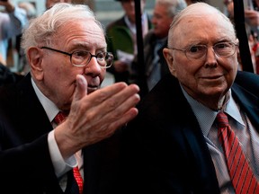 Berkshire Hathaway Inc vice-chairman Charlie Munger, right, with Warren Buffett at the 2019 annual shareholders meeting in Omaha, Nebraska.