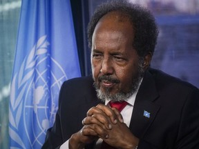 FILE - Somalia's President Hassan Sheikh Mohamud listens during an interview on his visit to the United Nations, Dec. 12, 2023, at U.N. headquarters. Somalia on Wednesday, Dec. 13, secured a $4.5 billion debt relief deal from its international creditors, the International Monetary Fund and World Bank said, which will allow the nation to develop economically and take on new projects. "Somalia's debt relief process has been nearly a decade of cross governmental efforts spanning three political administrations. This is a testament to our national commitment and prioritization of this crucial and enabling agenda," said Hassan Sheikh Mohamud.