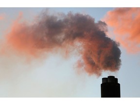 Vapour rises from a chimney at Drax Power Station in Selby, UK. Photographer: Chris Ratcliffe/Bloomberg