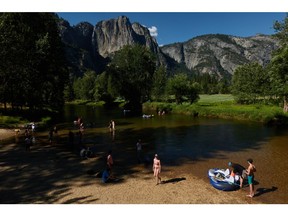 Tourists on the Merced River in Yosemite National Park, California, in 2022. The US travel industry is severely lagging its top 17 competitors, according to a study released on Jan. 11 by Euromonitor International.