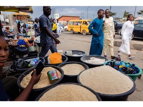A market stall vendor in Lagos, Nigeria. Photographer: Benson Ibeabuchi/Bloomberg