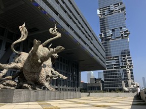 A bull sculpture in front of the Shenzhen Stock Exchange building in Shenzhen, China, on Tuesday, Jan. 16, 2024. The China stock rout has run so deep and long that even some of the skeptics are preparing for at least a short-term bounce. Source:  /Bloomberg