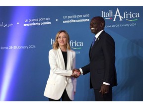 Italian Prime Minister Giorgia Meloni, left, welcomes Kenyan President William Ruto at the Italy Africa summit in Rome, Italy, on Jan. 29.