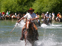 Joe Lewis on horseback riding during an employee trip to his 12,000-hectare property in Argentina in 2006.