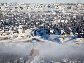 An ice fog hangs over steaming neighbourhoods during a cold snap in Calgary on Saturday, Jan. 13, 2024.
