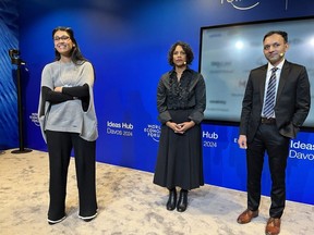 L- Roshni Nadar Malhotra, Chairperson, HCLTech along with the two Aquapreneurs at World Economic Forum 2024