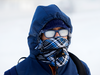Student in Edmonton bundled up against cold