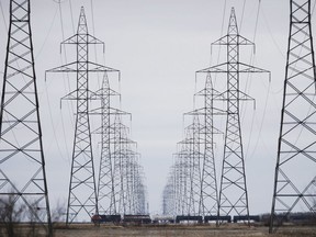 Severe drought in Western Canada is putting pressure on hydroelectricity generation, forcing two hydro-rich provinces to import power from other jurisdictions due to low reservoir levels. Manitoba Hydro power lines are photographed just outside Winnipeg, Monday, May 1, 2018.