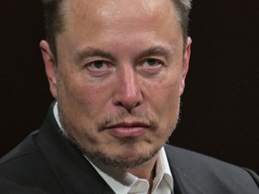 Elon Musk was hit with a ruling Tuesday invalidating his 2018 pay package — the largest in U.S. corporate history — after an investor claimed it was flawed by conflicts of interests and misleading disclosures by the electric-car company.