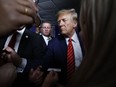 Donald Trump signs autographs and shakes hands with supporters at The Margate Resort in Laconia, New Hampshire on Jan. 22.