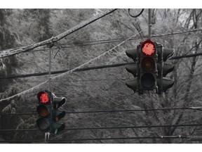 Icicles hanging from red traffic lights. Photographer: Bloomberg Creative Photos/Bloomberg Creative Collection