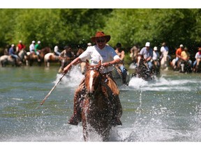 Joe Lewis horseback riding during an employee trip to his property in Argentina in 2006.