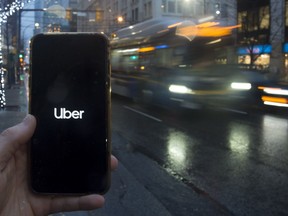 The Uber App is pictured on a smart phone in downtown Vancouver, B.C., Monday, December 30, 2019.