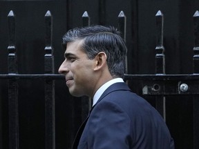 Britain's Prime Minister Rishi Sunak leaves 10 Downing Street to attend the weekly session of Prime Ministers Questions in parliament, in London, Wednesday, Jan. 10, 2024.