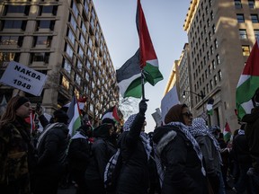 Pro-Palestine demonstrators march through the streets during a rally on Jan. in Washington, D.C.