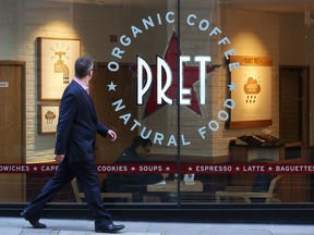 A pedestrian passes a Pret A Manger sandwich store, operated by private equity firm Bridgepoint, in London, U.K.