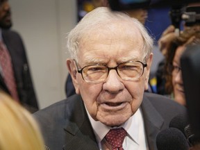 FILE - Warren Buffett, Chairman and CEO of Berkshire Hathaway, during a tour of the CHI Health convention center where various Berkshire Hathaway companies display their products, before presiding over the annual shareholders meeting in Omaha, Neb., Saturday, May 4, 2019. Buffett topped The Chronicle of Philanthropy's annual list of the biggest charitable donations in 2023, with his $541.5 million gift to the Susan Thompson Buffett Foundation.