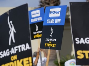 FILE - Picketers demonstrate outside Paramount Pictures studio on Wednesday, Sept. 27, 2023, in Los Angeles. Unions commanded big headlines last year, but that didn't translate into higher membership numbers, according to government data released Tuesday, Jan. 23, 2024.