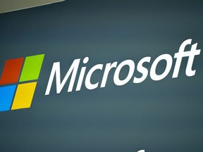 FILE - The Microsoft logo is shown at the Mobile World Congress 2023 in Barcelona, Spain, on March 2, 2023. Starting in February, some new personal computers that run Microsoft's Windows operating system will have a special "Copilot key" that launches the software giant's AI chatbot.