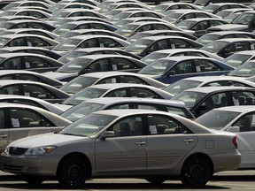 Toyota cars await shipping at the Toyota Logistics parking lot at the Long Beach Port on March 10, 2004, in Long Beach, Calif. Toyota Canada Inc. has re-issued an urgent 'Do not drive' warning for 7,300 cars that never had defective Takata airbags replaced.