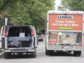 Your parents are finally downsizing after 40 years in the same house -- and you want to help. Where to even start?A U-Haul truck passes a van loaded with furniture in Montreal on Friday, July 1, 2022.