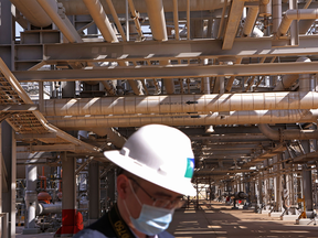 A Saudi Aramco employee at the Khurais Processing Department in the Khurais oil field in Khurais, Saudi Arabia