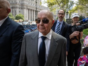 Billionaire Joe Lewis leaves court in New York