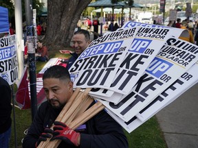 Members of the California Faculty Association rally and picket during a strike at San Francisco State University on Tuesday, Dec. 5, 2023.
