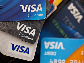 A pile of Visa credit cards