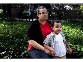 Amy Funes and her son Leo in New York. Photographer: Jackie Molloy/Bloomberg