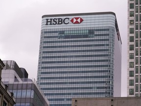 FILE - The HSBC headquarters stand in the financial district of Canary Wharf, in London, Monday, March 13, 2023. UK regulators say HSBC has been fined $72.8 million for failing to adequately protect customer deposits in the event the bank collapsed.