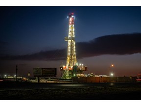 An oil drilling rig in Midland, Texas, US, on Thursday, March 2, 2023. Thousands of miles away from the turmoil on Wall Street, Midland, Texas that ranked No.1 in the US for inflation just over a year ago has since ceded that title – only to lay claim to a different one: the country's pay-raise capital. Photographer: Sergio Flores/Bloomberg