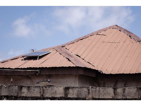 A solar panel on the roof of a home in Lagos, Nigeria, on Thursday, Sept. 28, 2023. Nigeria's abrupt decision to end fuel subsidies is both jump-starting a solar future and making electricity more expensive in Africa's biggest city.