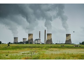 The Eskom Holdings SOC Ltd. Arnot coal-fired power station in Mpumalanga, South Africa, on Tuesday, Dec. 26, 2023. Coal-fired power plants operated by South Africa's state utility are emitting pollutants that primarily cause respiratory diseases such as asthma at almost 42 times the intensity of those in China. Photographer: Waldo Swiegers/Bloomberg