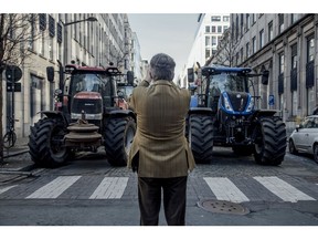 Tractors blocking the streets during a protest by farmers in Brussels, Belgium, on Thursday, Feb. 1, 2024. At least 1,300 tractors clogged streets in Brussels near European Union institutions Thursday morning as farmers staged a protest aimed at the bloc's leaders meeting nearby for a summit. Photographer: Cyril Marcilhacy/Bloomberg