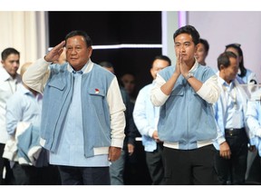Prabowo Subianto, left, with running mate Gibran Rakabuming Raka, son of President Joko Widodo. Photographer: Dimas Ardian/Bloomberg