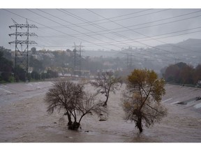 The Los Angeles River during a storm in Los Angeles, California, US, on Tuesday, Feb. 6, 2024. The risk of flash flooding and landslides persists for 21 million people across California as rains from a deadly atmospheric river keep falling throughout the day.