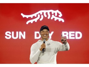 PACIFIC PALISADES, CALIFORNIA - FEBRUARY 12: Tiger Woods speaks during the launch of Tiger Woods and TaylorMade Golf's new apparel and footwear brand "Sun Day Red" at Palisades Village on February 12, 2024 in Pacific Palisades, California.