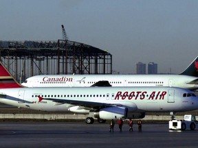 A Roots Air plane taxis out for the airline's first flight from Pearson International Airport in Toronto Monday March 26, 2001.