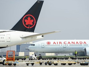 Air Canada posts its first annual profit since before the pandemic.