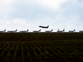 A line of planes wait to take off